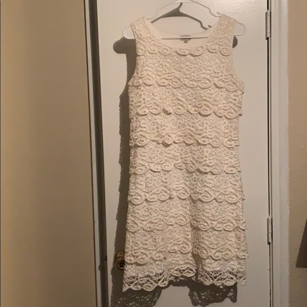Cream colored crochet overlay dress.